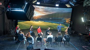 Students on virtual reality film set.